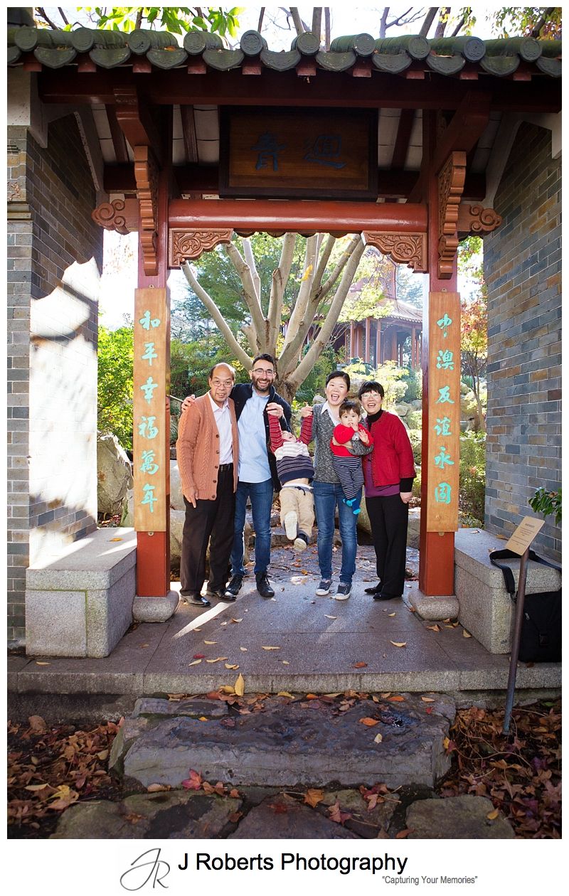 Family portrait photography Sydney at the Chinese Gardens of Friendship Darling Harbour for 60th birthday present